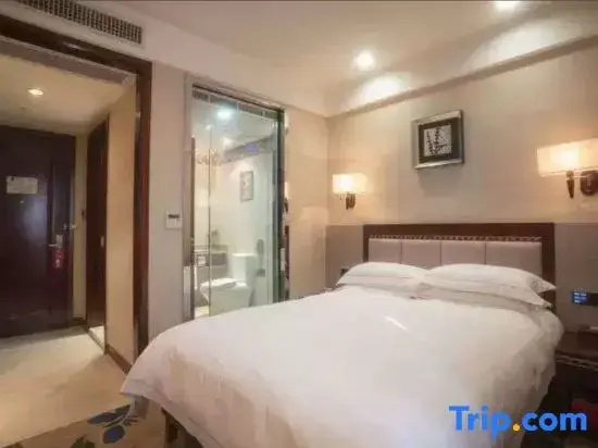 Dong Cheng Hotel - Chambres
