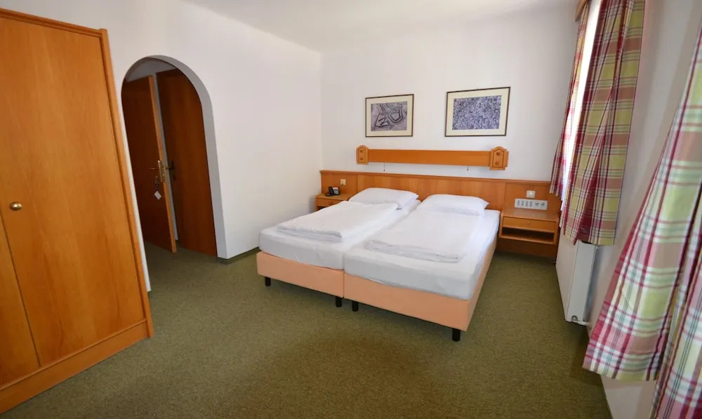 Hotel und Aparthotel Almrösl - Chambres