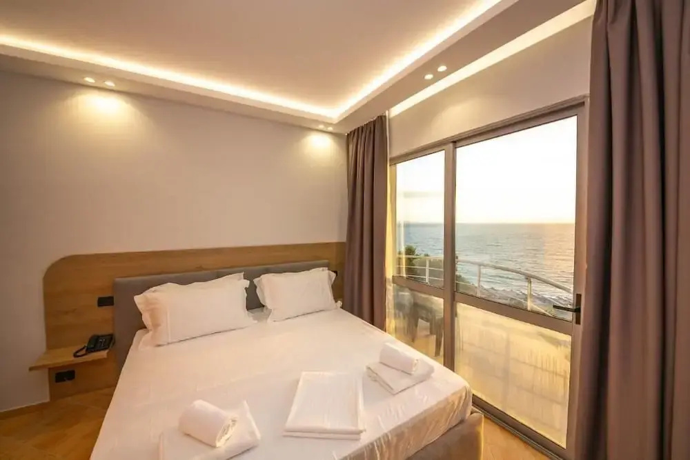 Deluxe Double room with balcony and with sea view (full double bed)