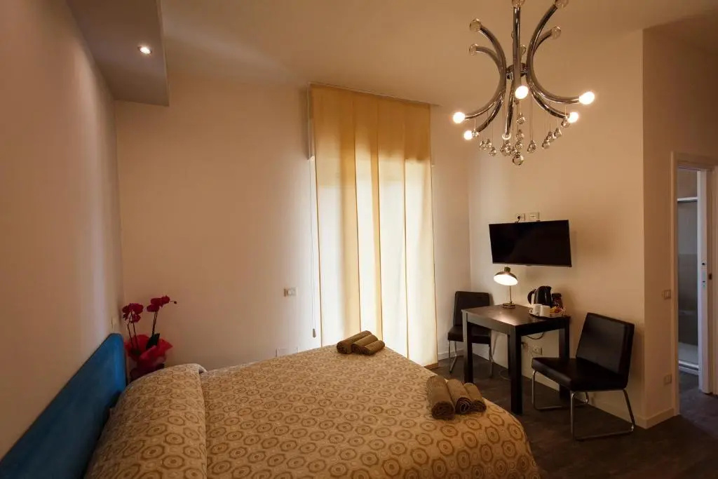 B Amp B Corso Diaz - Chambres