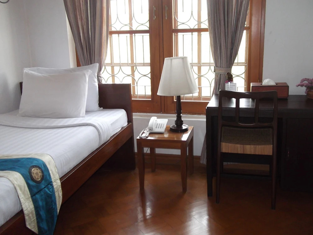 Classique Inn - Chambres