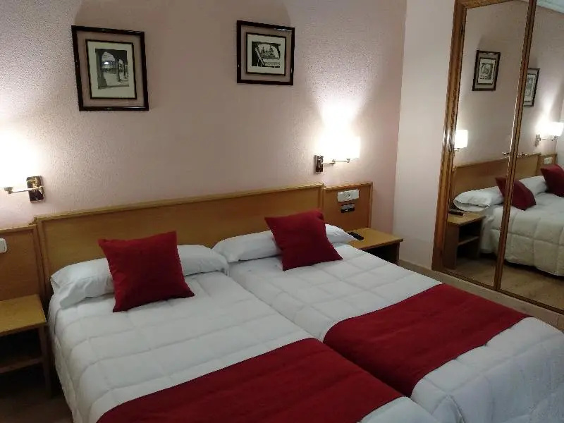 Hotel Helmántico - Chambres