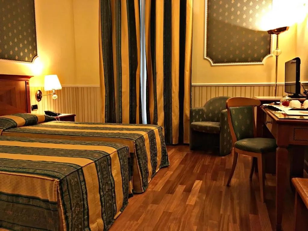 Andreola Central Hotel - Chambres