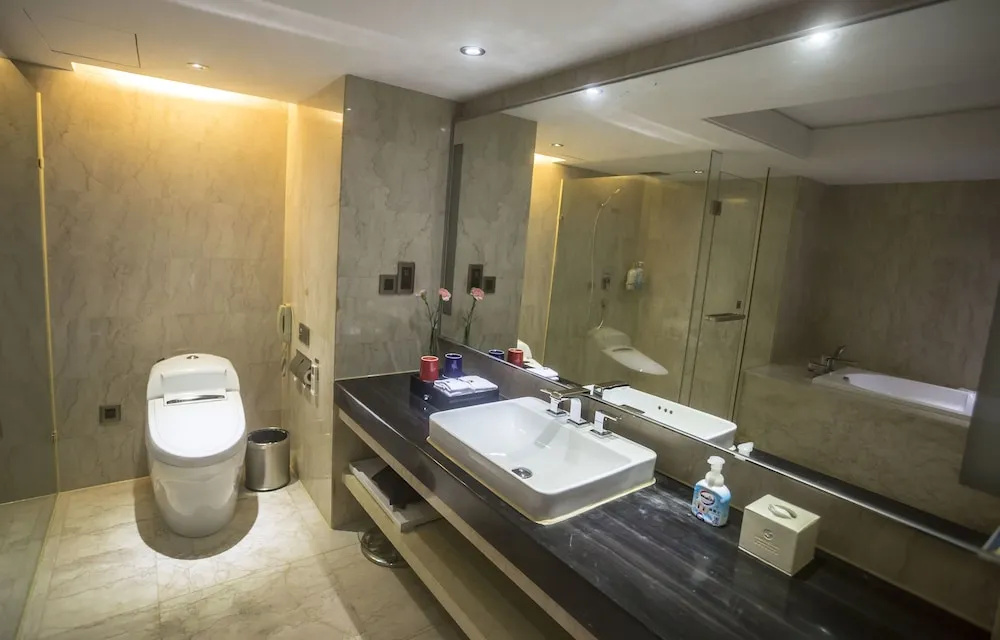 Manhattan Kinlen Hotel - Shishi - Chambres