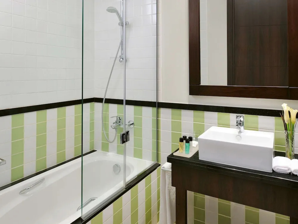 Movenpick Hotel Apartments Al Mamzar Dubai - Chambres