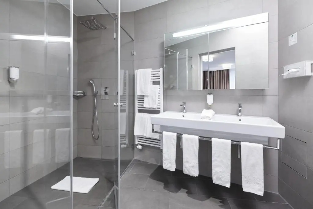 Central City Hotel Rochat - Chambres