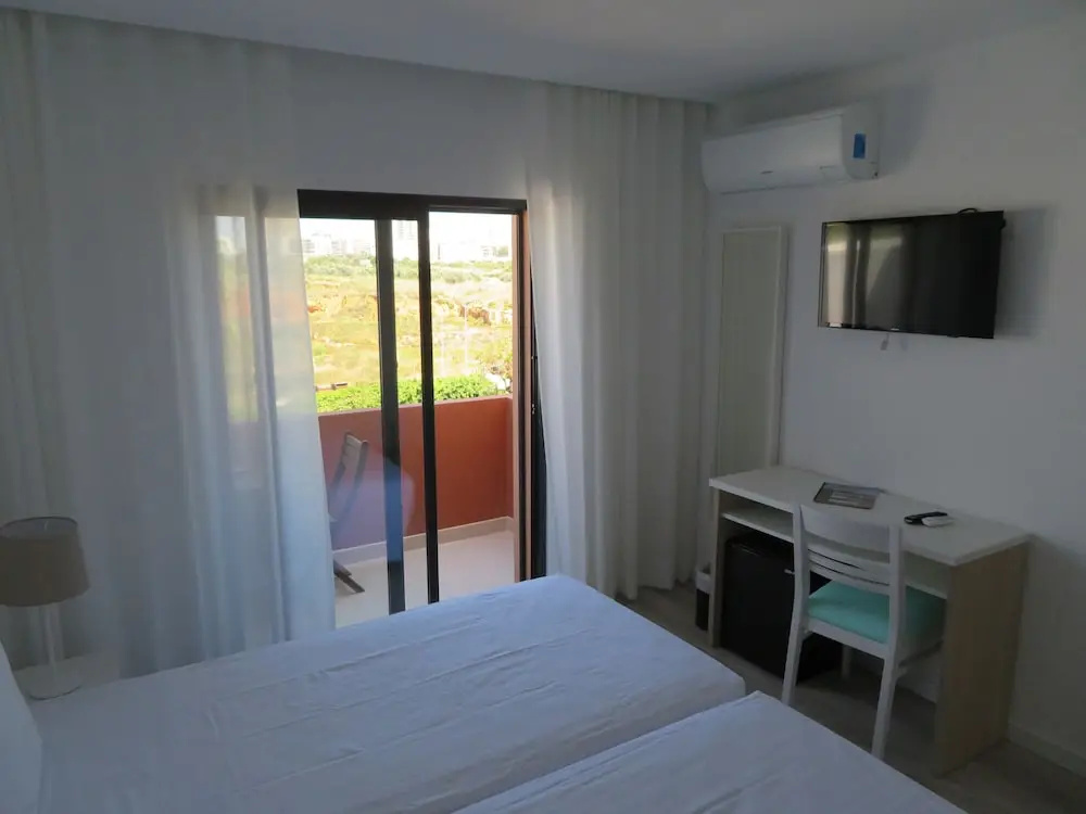 Deluxe Double room with balcony and with garden view (twin beds)