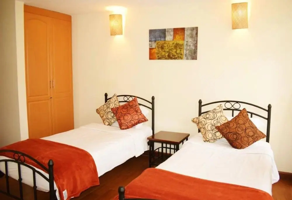 Cerenata Gardens Suites - Chambres