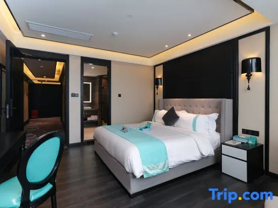 Xinliyuan Hotel - Chambres