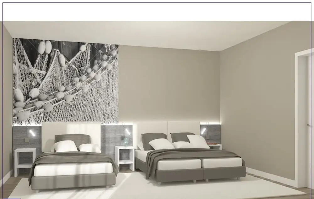Standard Quadruple room with balcony and with partial sea view