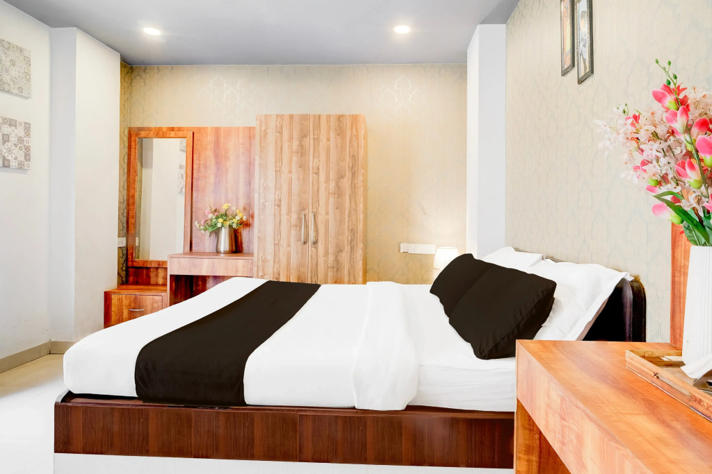 OYO Premium Beltola Tiniali - Chambres
