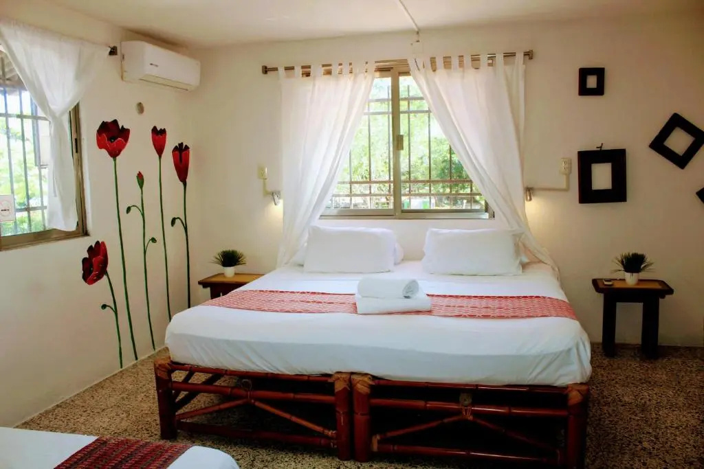 Hostal & Suites Pata de Perro - Chambres
