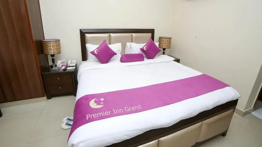 Hotel Premier Inn Grand - Chambres
