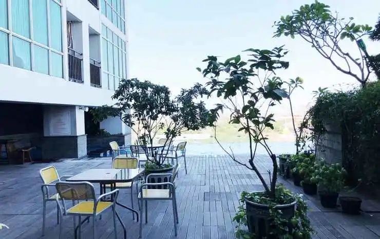 Minimalist 2BR Apartment at Tamansari Papilio By Travelio
