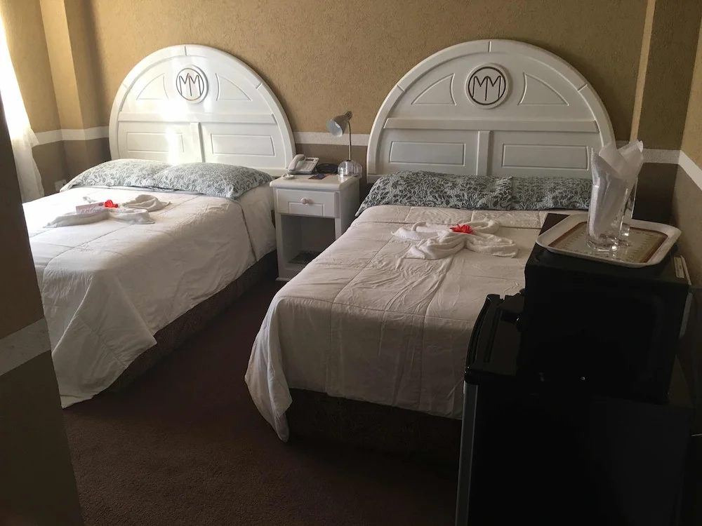 Millenium Manor Hotel - Chambres