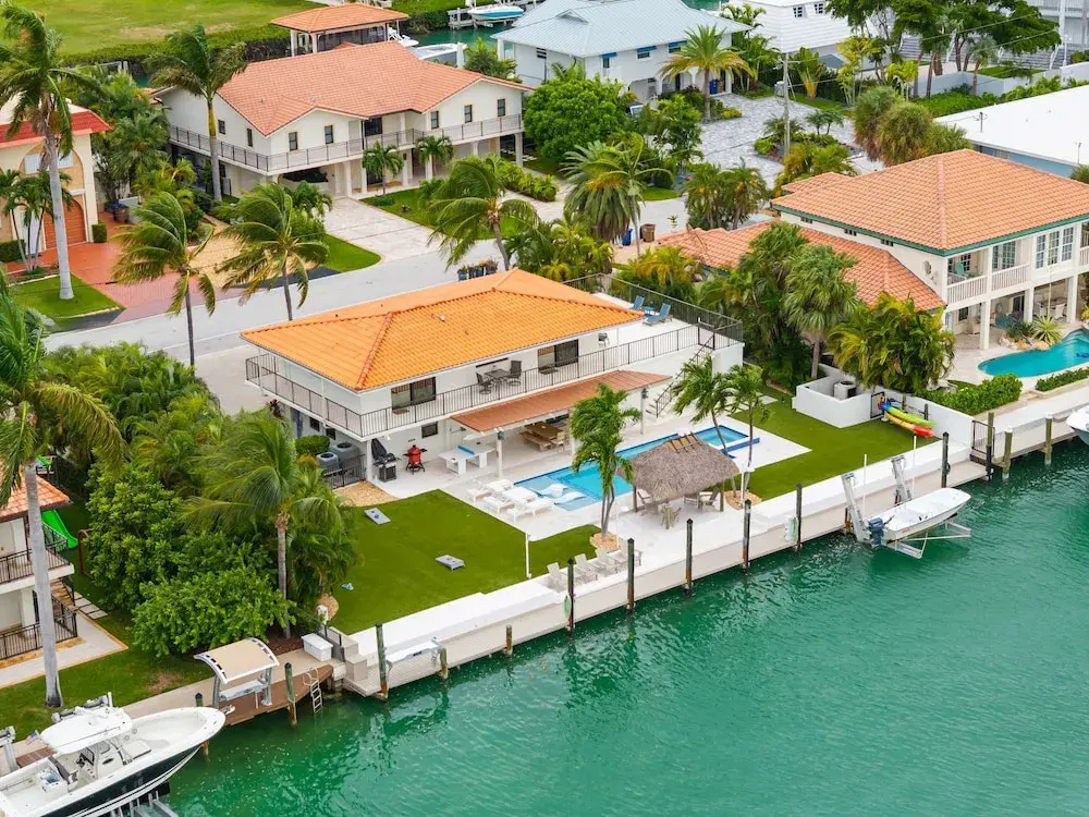 Deep Blue Waterfront Gem Pool Kayaks Dock