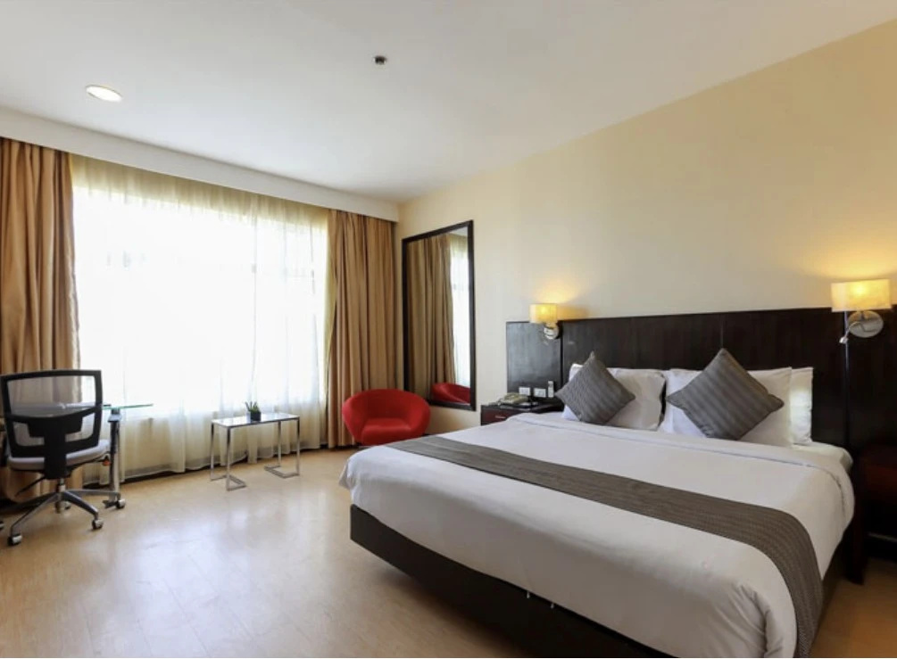 Paseo Premiere Hotel - Chambres