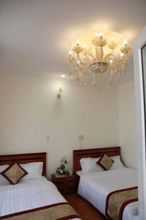 Dang Uyen Hotel - Chambres