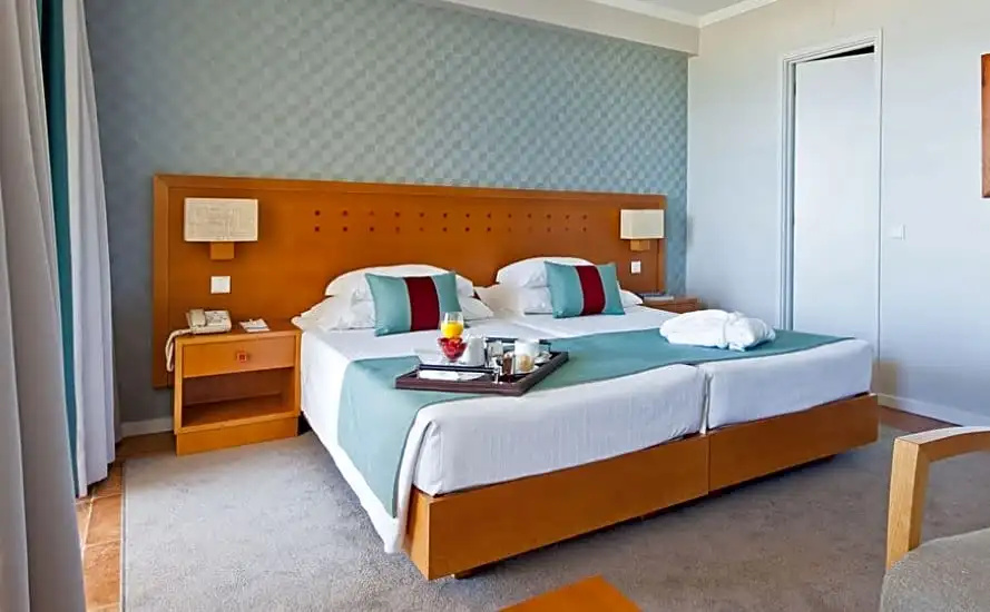 Ozadi Altura Beach Resort  - Chambres