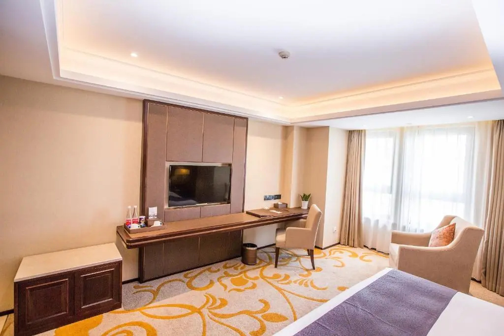 Sky World Hotel Qingdao - Chambres