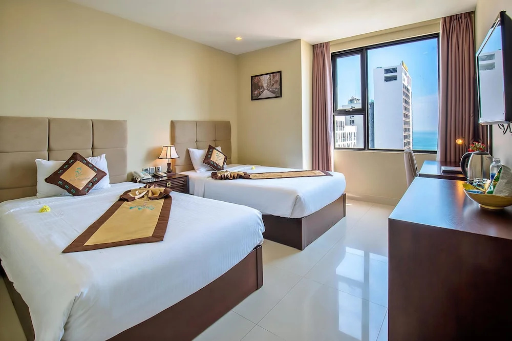 Deluxe Quadruple room with sea view