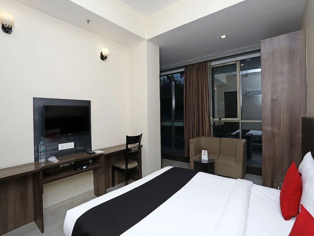 Capital O 3831 Jade Inn - Chambres