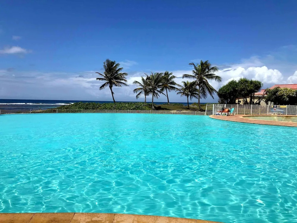 Ti. Maanga vue mer et pieds dans l'eau - Général