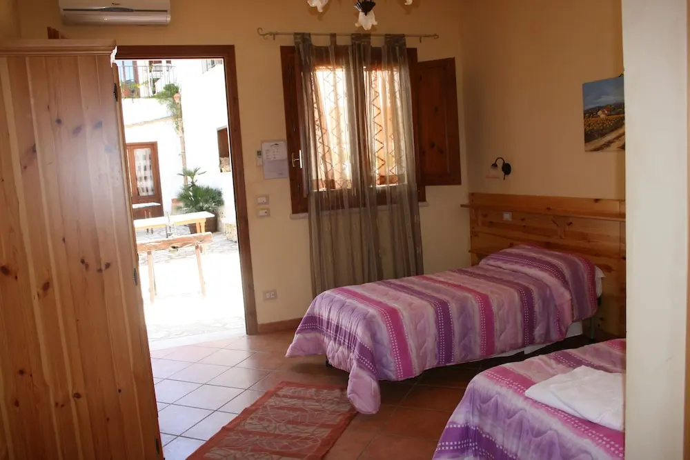 Hotel & Residence Il Cortile - Chambres