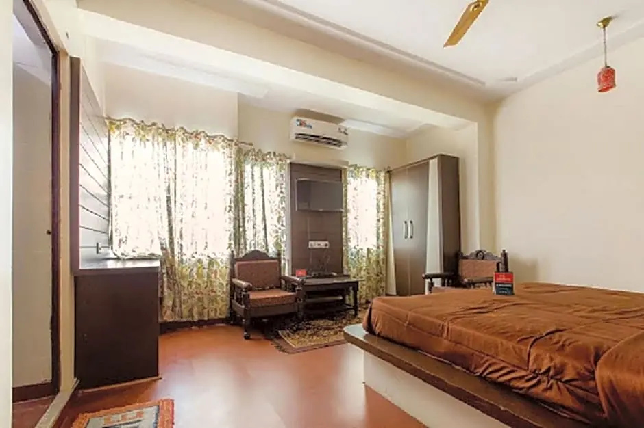 Hotel Holiday Home - Chambres