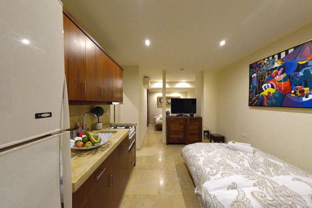 Luxury Quadruple Suite with garden view