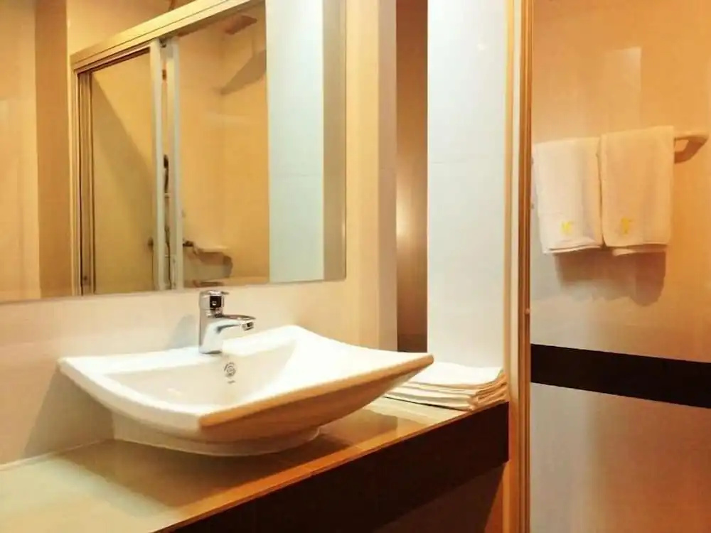 Sinkiat Buri Hotel - Chambres