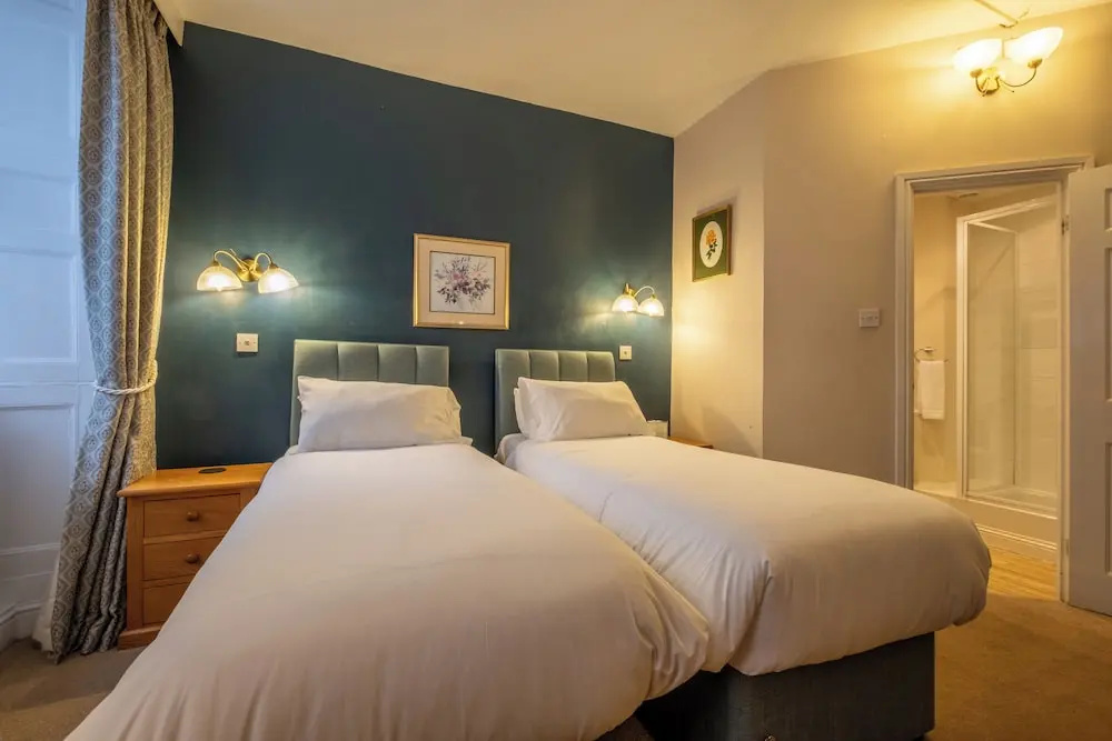 Corinium Hotel & Restaurant - Chambres