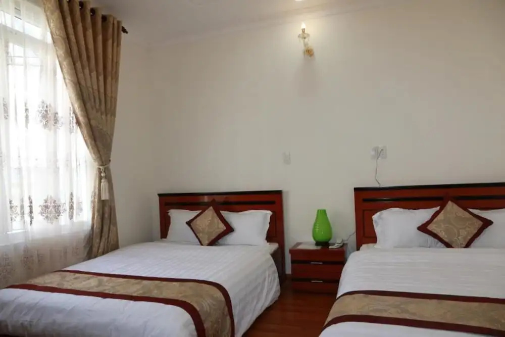 Dang Uyen Hotel - Chambres