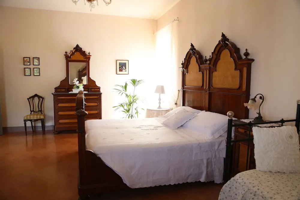 Deluxe Quadruple room with balcony