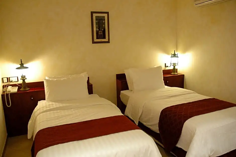 Al Liwan Suites - Chambres