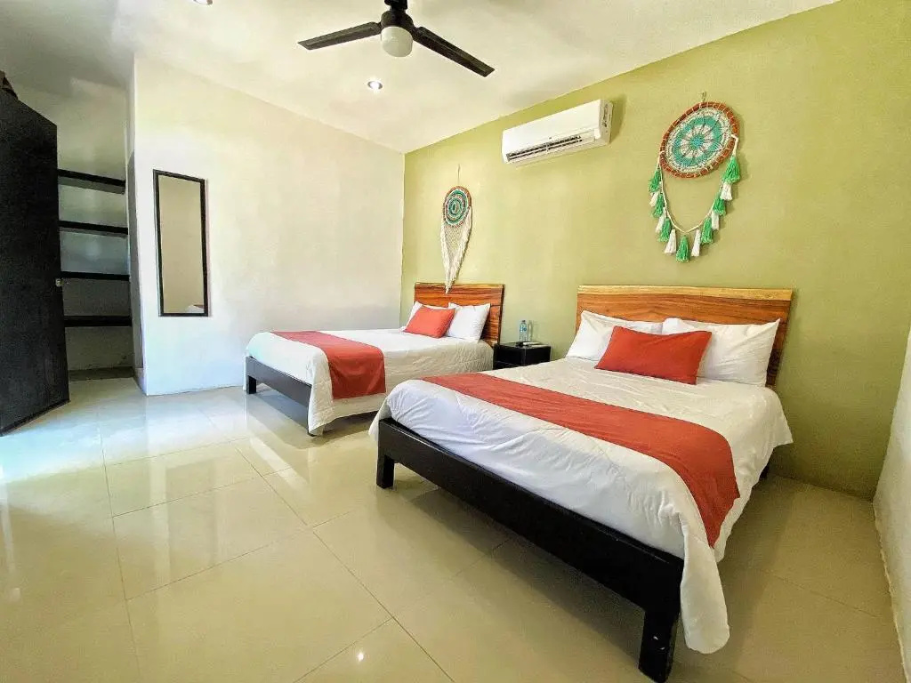 Standard Quadruple room with garden view
