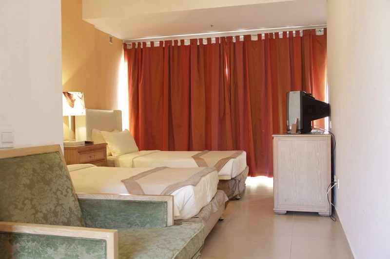 Hotel Ritz Sumbe - Chambres