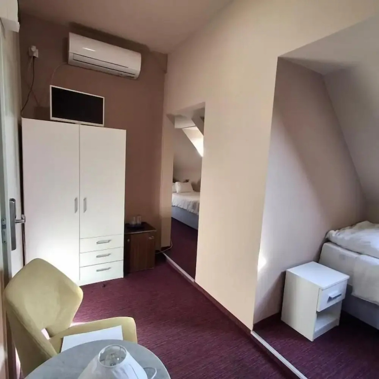 Hotel Unicornis - Chambres