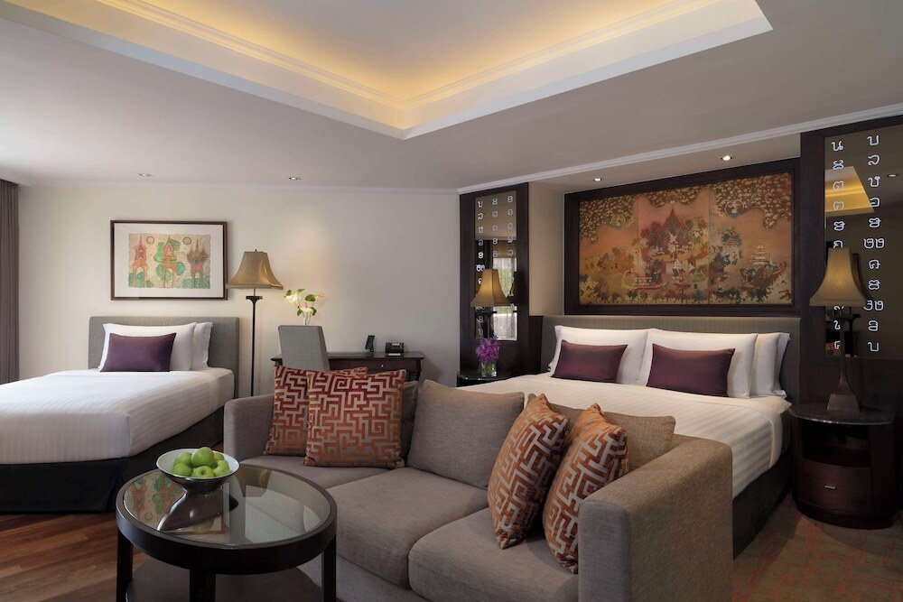Люкс семейный с балконом в Anantara Riverside Bangkok Resort