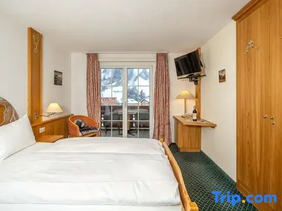 Grichting Hotel & Serviced Apartments - Chambres