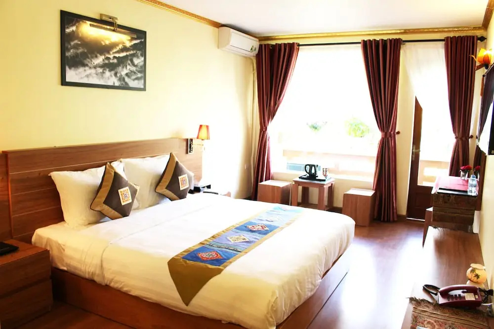 Deluxe Double room with balcony and with city view (full double bed)