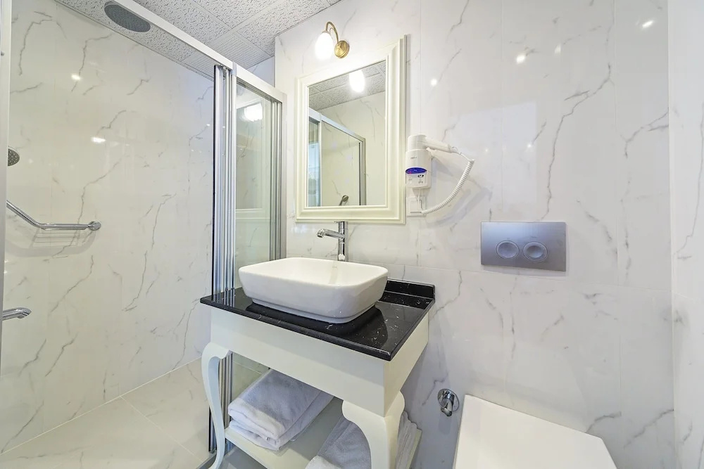 Spectra Hotel - Chambres
