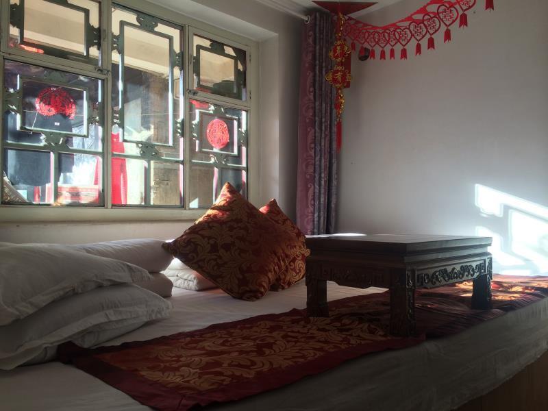 Двухместный номер Deluxe двуспальная кровать в Ping Yao Fu Lin Yuan Hostel