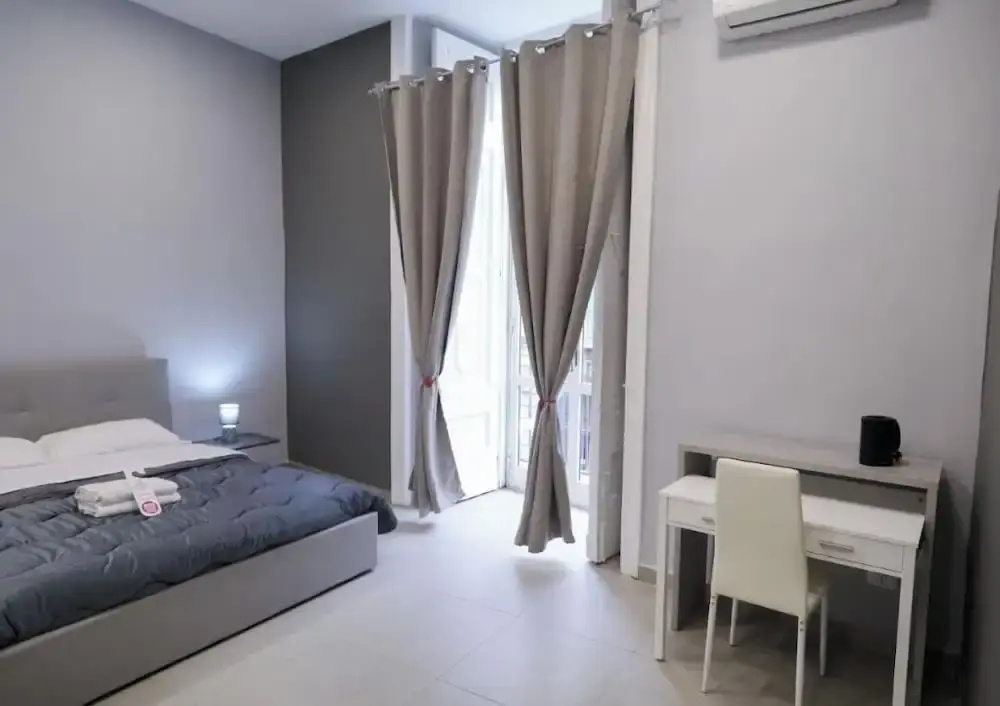 Economy Quadruple room with balcony and with city view