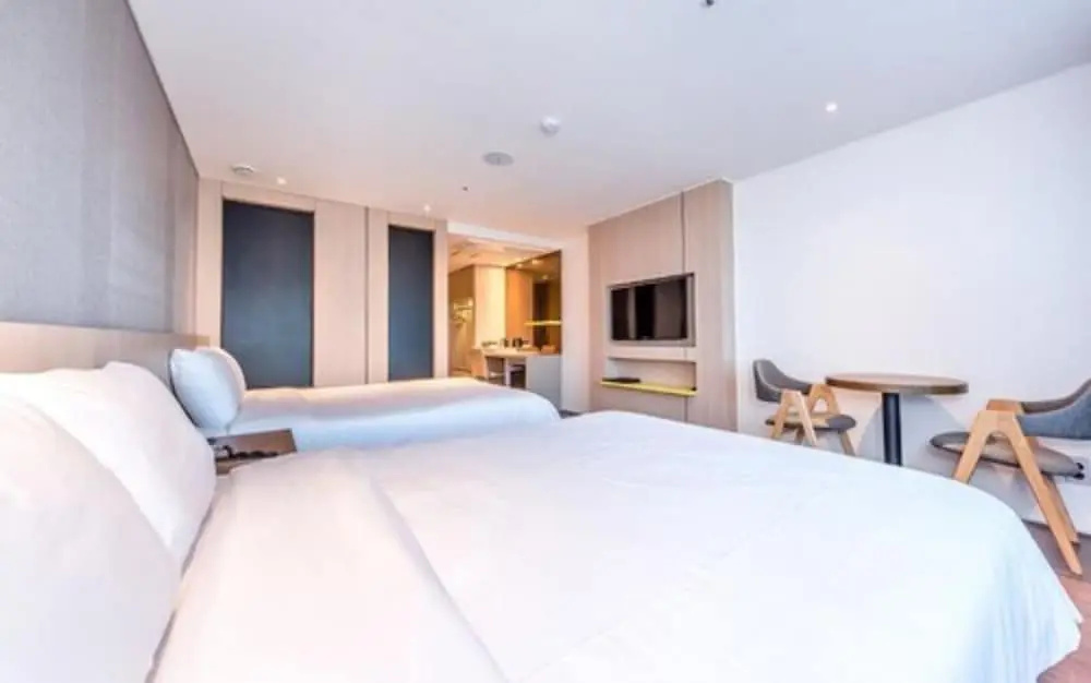 Noblepia Hotel - Chambres