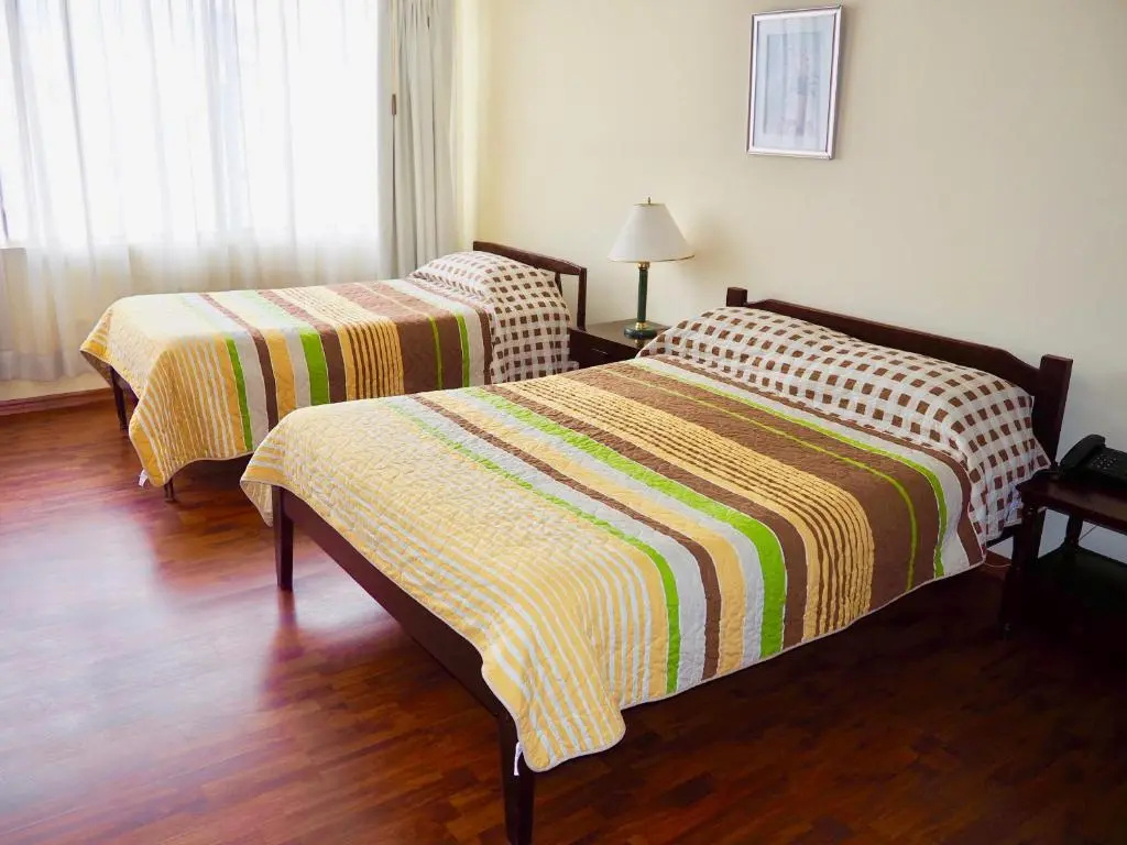 Hotel 6 de Diciembre - Chambres