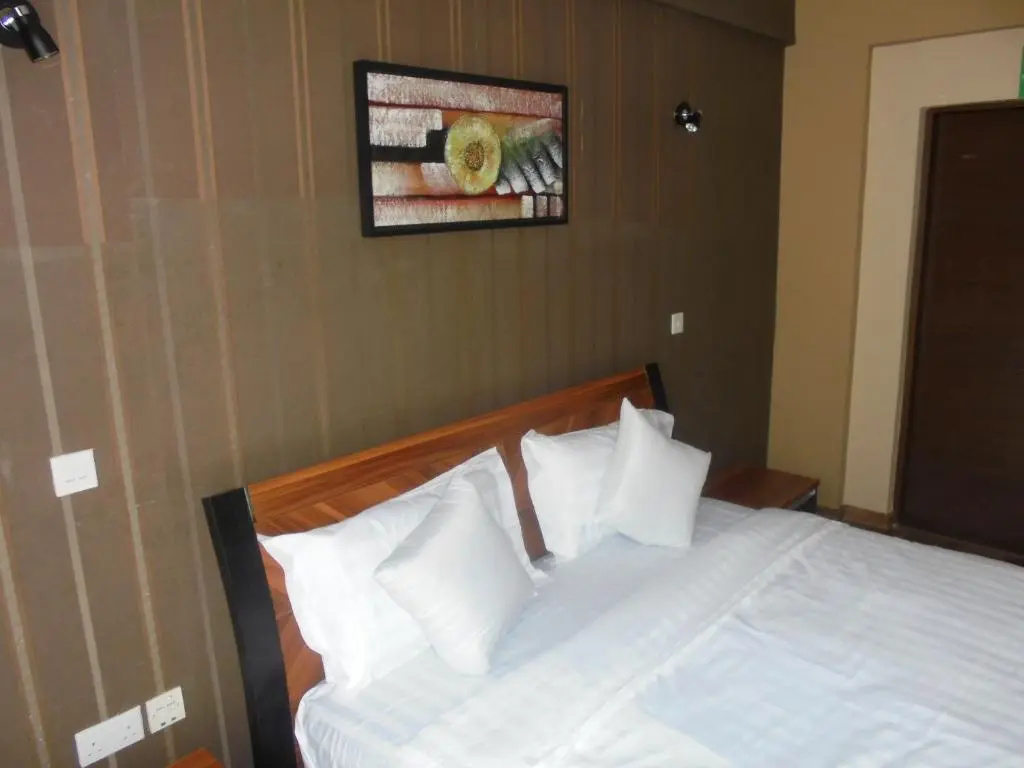 WE Hotel and Suites - Chambres