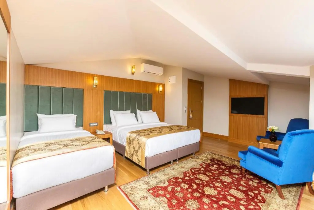 Acra Special Class Hotel - Chambres
