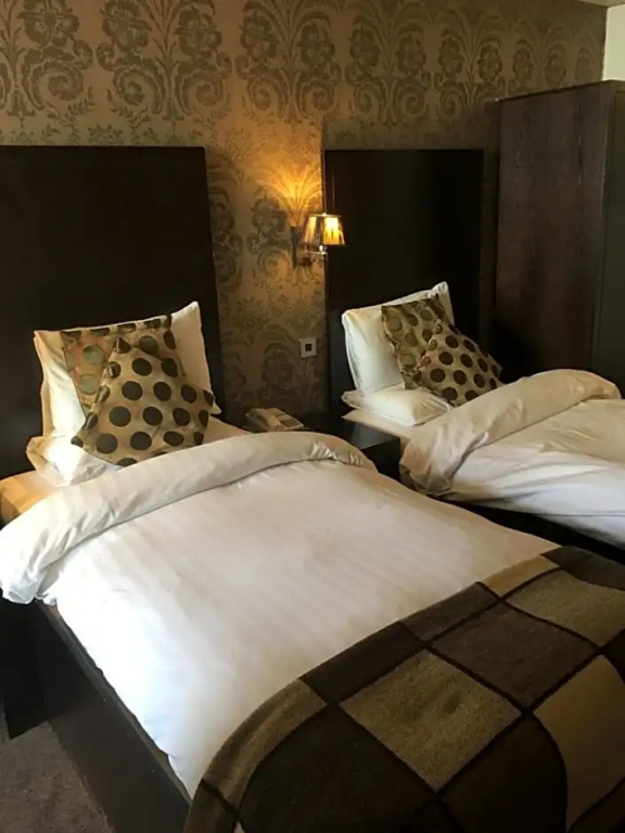 Inn On The Prom Hotel - Chambres