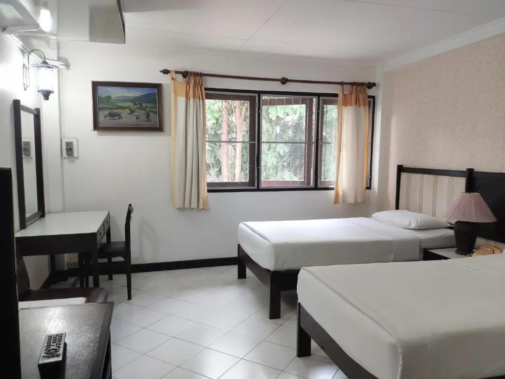 Changpuak Hotel - Chambres